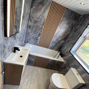 bathroom with wood paneling clean